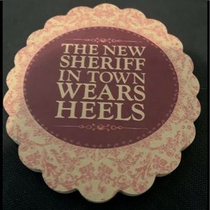 THE NEW SHERIFF IN TOWN WEARS HEELS